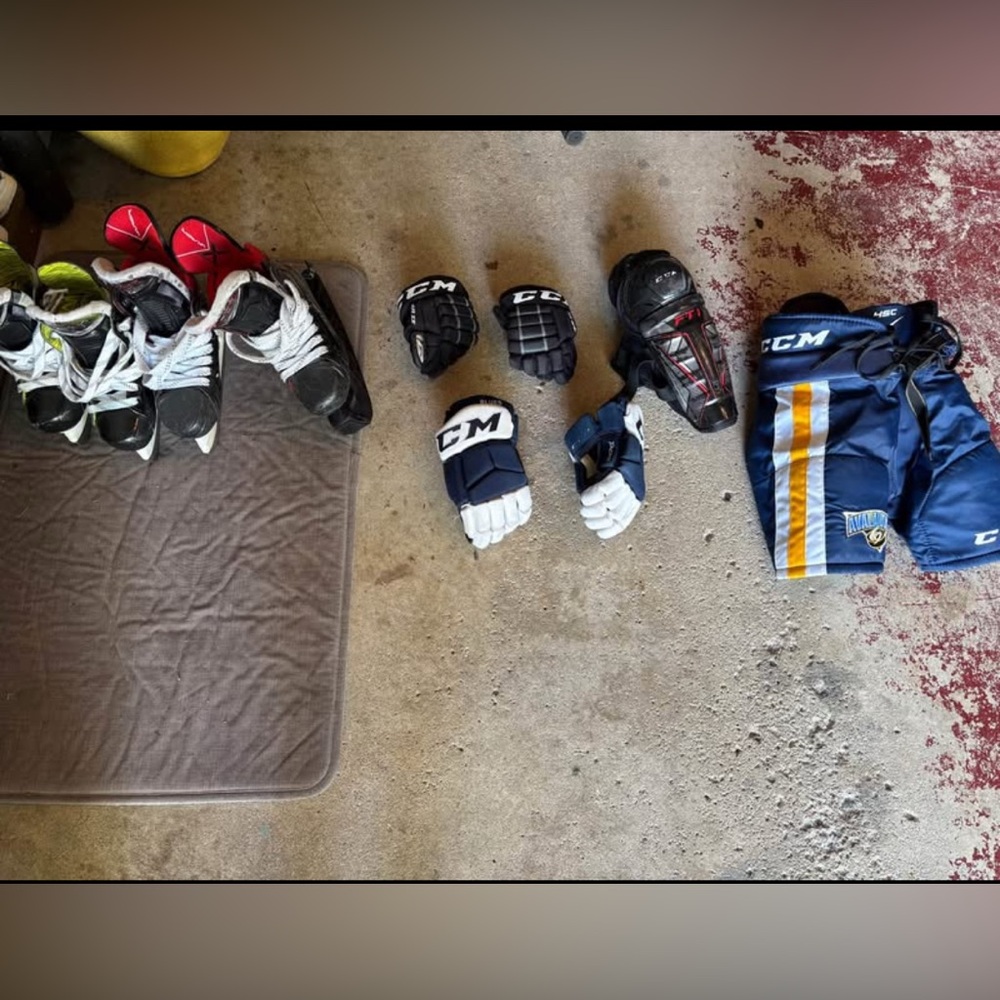 Hockey skates and equipment.